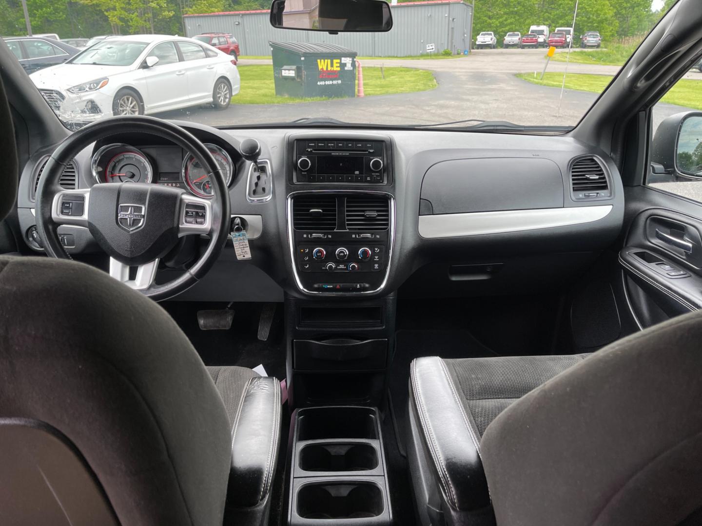 2015 Black /Black Dodge Grand Caravan SE Black Top (2C4RDGBG1FR) with an 3.6L V6 DOHC 24V FFV engine, 6-Speed Automatic transmission, located at 11115 Chardon Rd. , Chardon, OH, 44024, (440) 214-9705, 41.580246, -81.241943 - Photo#28